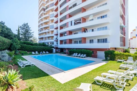Property building, Living room, Swimming pool