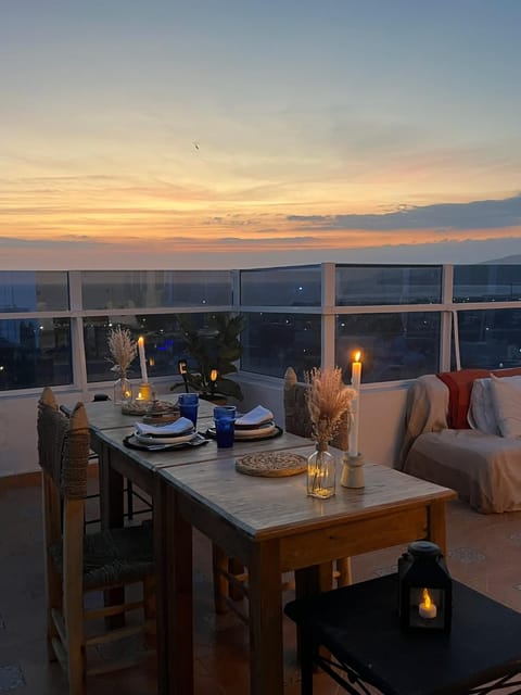 View (from property/room), Balcony/Terrace, Seating area, Dining area, Sunset