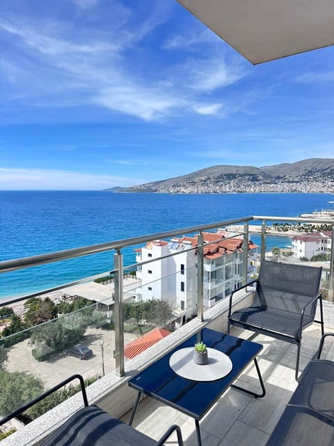 Property building, View (from property/room), Balcony/Terrace, Seating area, Beach, Sea view