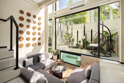 Living room, Seating area, Pool view