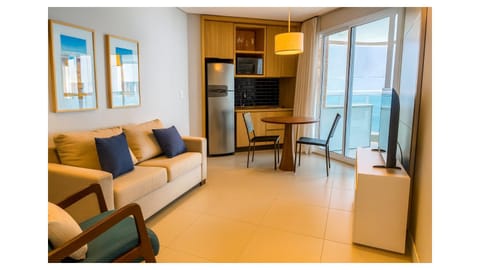 TV and multimedia, Coffee/tea facilities, Kitchen or kitchenette, Living room, Seating area, Dining area, microwave, oven, air conditioner