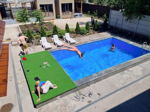 Day, People, Pool view, Swimming pool, group of guests, sunbed