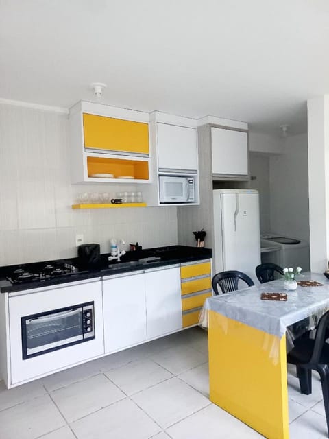 Dining area, microwave, oven, stove