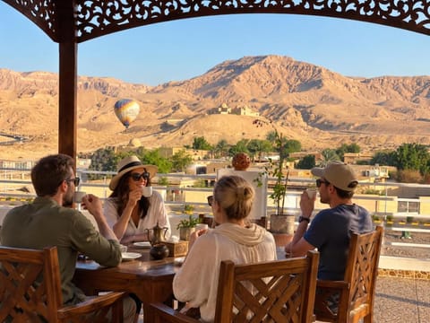 Patio, Restaurant/places to eat, People, Natural landscape, View (from property/room), Balcony/Terrace, Food and drinks, Dining area, Mountain view, group of guests