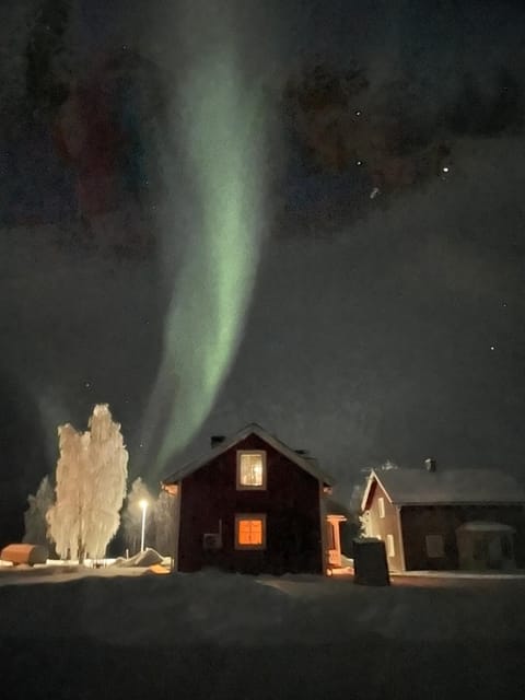 Tvåvåningshus i lantlig miljö House in Norrbotten County, Sweden