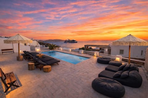 Natural landscape, View (from property/room), Seating area, Pool view, Sea view, Swimming pool, Sunset, sunbed