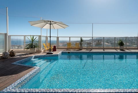 Patio, Day, Natural landscape, Mountain view, Pool view, Swimming pool, sunbed