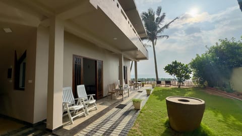 Property building, Patio, Day, Garden, View (from property/room), Beach, Beach, Garden view, Sunrise, Sunset