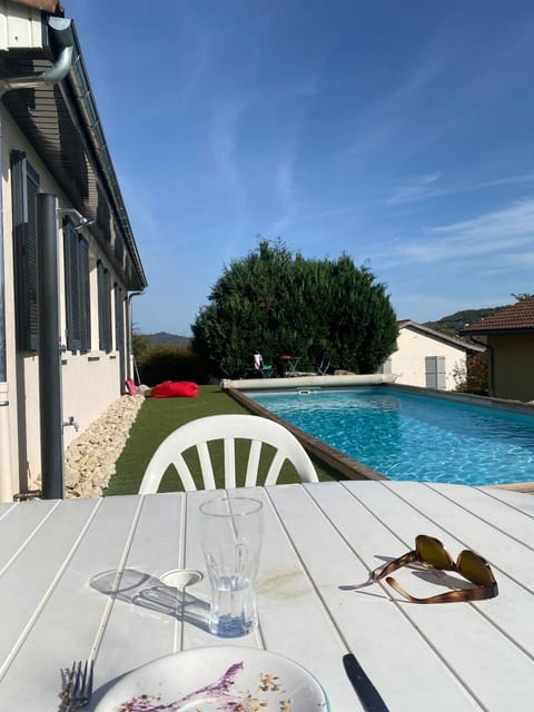 Property building, Patio, Pool view, Swimming pool, sunbed