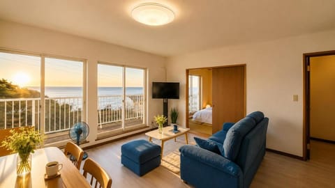 Communal lounge/ TV room, Natural landscape, TV and multimedia, View (from property/room), Balcony/Terrace, Living room, Seating area, Evening entertainment, Sea view