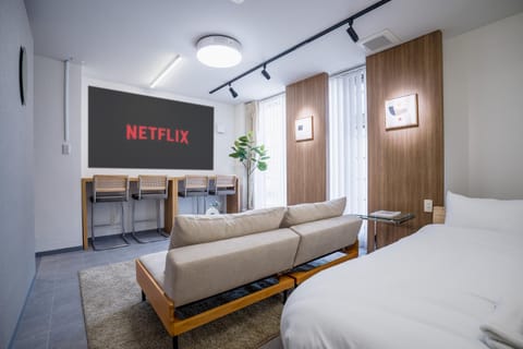 Bed, Living room, Seating area, Bedroom