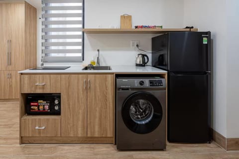 Kitchen or kitchenette, washing machine