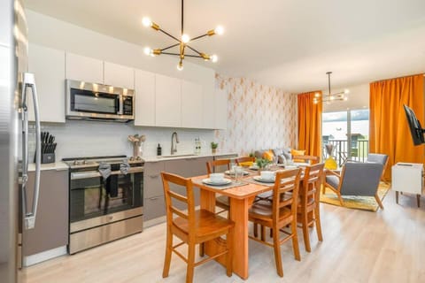 Kitchen or kitchenette, dishwasher, oven, stove