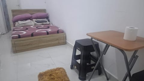 save more room with toilet and pantry Capsule hotel in Abu Dhabi