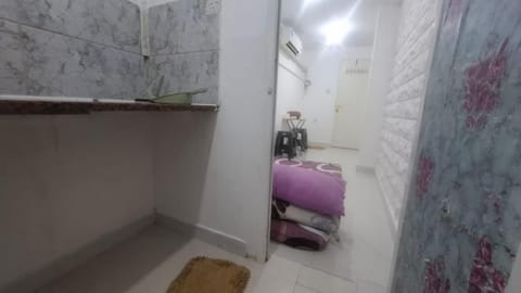 save more room with toilet and pantry Capsule hotel in Abu Dhabi