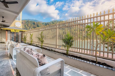 Property building, Patio, Restaurant/places to eat, Natural landscape, Garden, View (from property/room), Balcony/Terrace, Seating area, Lake view, Mountain view
