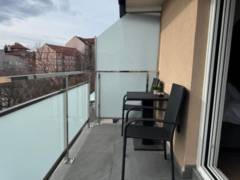 View (from property/room), Balcony/Terrace, Seating area, Dining area, Quiet street view