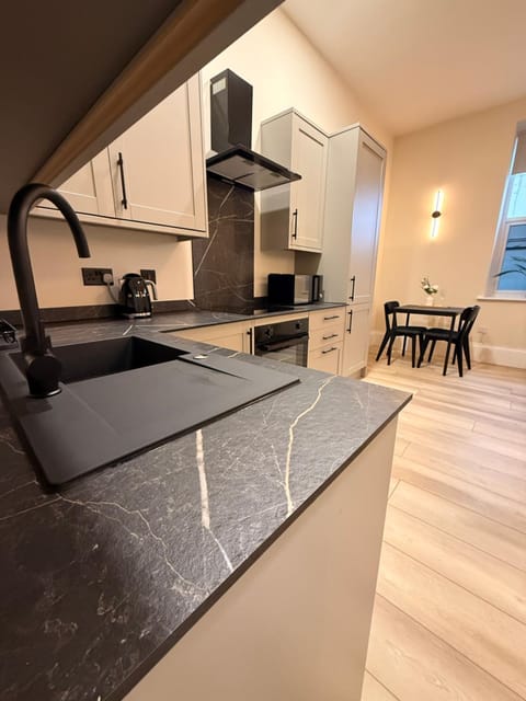 Kitchen or kitchenette, Dining area, dishwasher, oven, stove