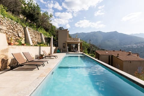 Property building, Living room, Swimming pool