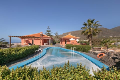 Property building, Living room, Swimming pool
