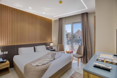 Bed, Living room, Photo of the whole room, Seating area, Bedroom, towels