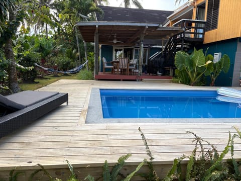 Property building, Pool view, Swimming pool, sunbed