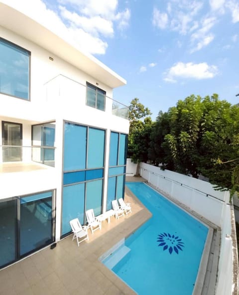 Property building, View (from property/room), Pool view, Swimming pool, sunbed