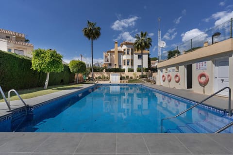 Property building, Living room, Swimming pool