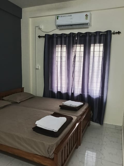 Bed, Photo of the whole room, Bedroom, towels, air conditioner