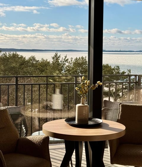 Day, Natural landscape, View (from property/room), Balcony/Terrace, Living room, Decorative detail, Seating area, Dining area, Sea view, Seasons, Time of day, Location