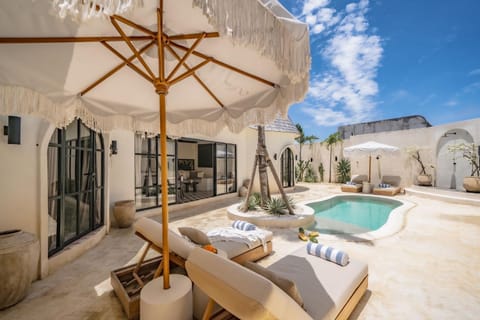 Patio, Day, Natural landscape, Pool view, Swimming pool, sunbed