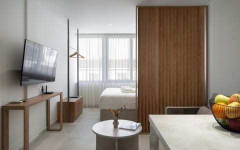 Communal lounge/ TV room, Bed, Seating area, Bedroom