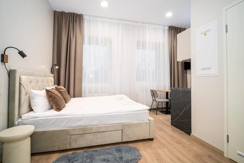 Bed, Seating area, Bedroom