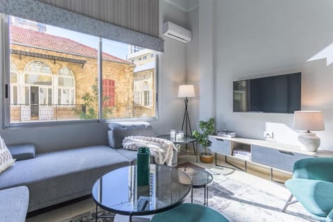 TV and multimedia, Living room, Seating area, City view, air conditioner