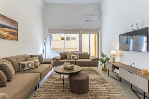 TV and multimedia, Living room, Seating area, City view, air conditioner