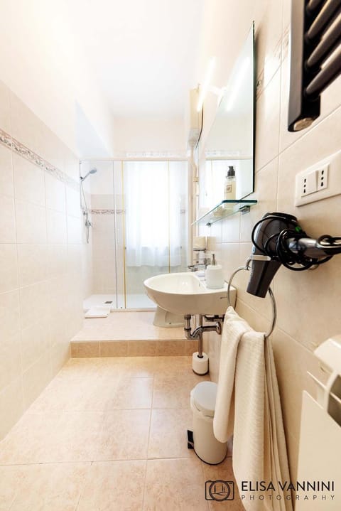 Shower, Bathroom, hair dryier, towels