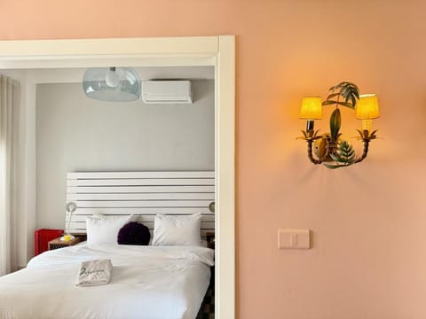 Bed, Photo of the whole room, Bedroom, towels, air conditioner