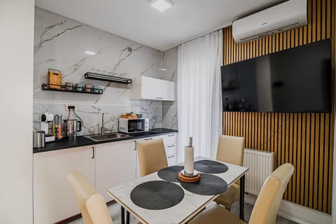Dining area, kitchen, air conditioner