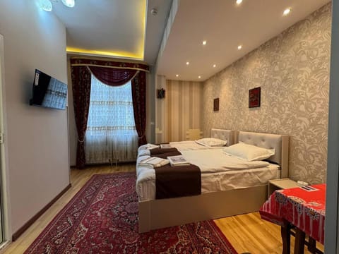 Bed, TV and multimedia, Photo of the whole room, towels