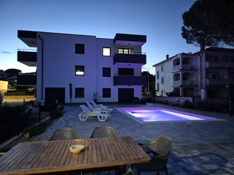 Property building, Night, Swimming pool