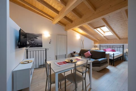 Communal lounge/ TV room, Bed, Dining area