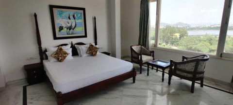 Bed, Natural landscape, View (from property/room), Photo of the whole room, Seating area, Bedroom