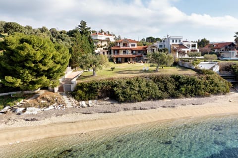 Property building, Day, Natural landscape, Beach, Sea view