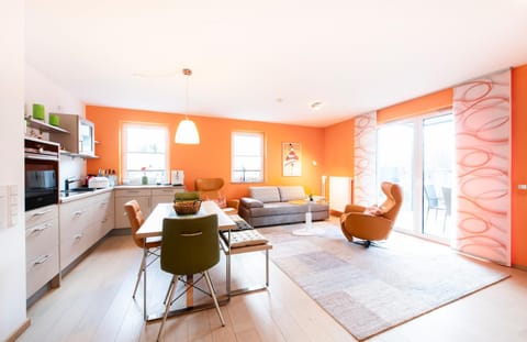 Kitchen or kitchenette, Living room, Seating area, Dining area