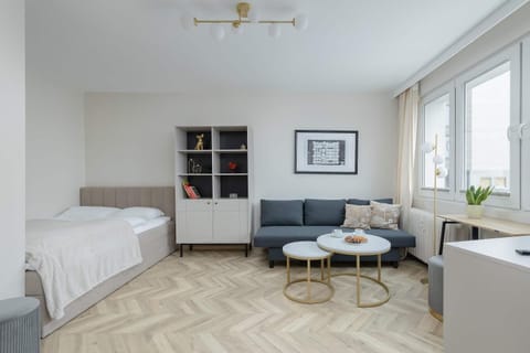 Bed, Living room, Seating area, Bedroom