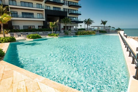 Property building, Natural landscape, Sea view, Swimming pool, sunbed