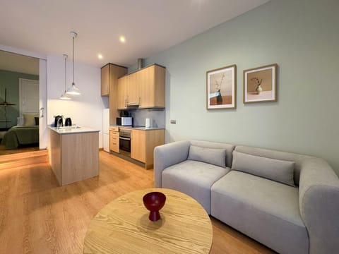 Kitchen or kitchenette, Living room, Seating area, Dining area