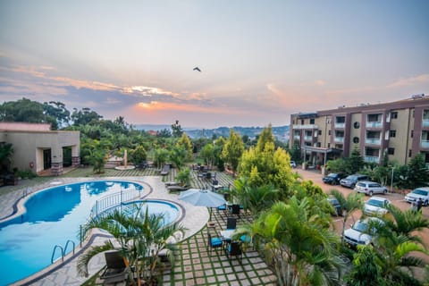 Property building, Day, Natural landscape, Bird's eye view, Pool view, Swimming pool, Sunrise, Sunset, sunbed