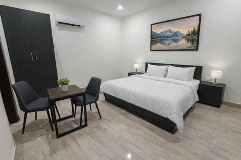 Bed, Photo of the whole room, Seating area, Bedroom, air conditioner