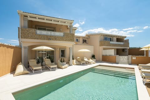 Property building, Living room, Swimming pool